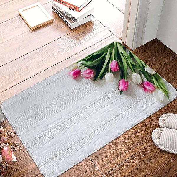 Mat on the floor beside a plant for light after-walk stretching